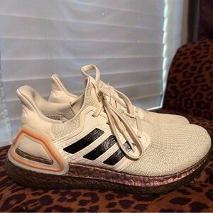 adidas White and Black Athletic Shoes with Orange Accents